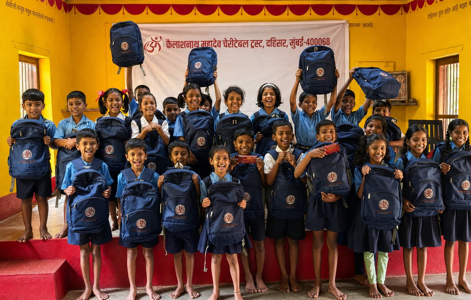 Children with school kits at a Trust community visit