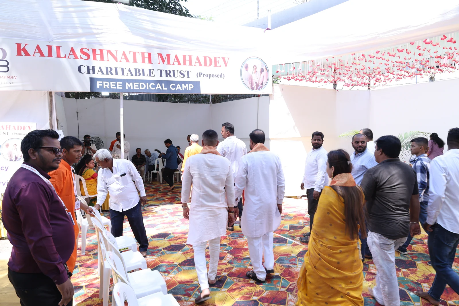 Visitors and Trust members at the entrance to the free medical camp in March 2024